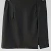 Jupes^Outfitbook Jupe fendue en similicuir noir
